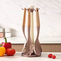Ensemble d'ustensiles de cuisine en silicone écologique mauve 6 pièces avec support rotatif à manche en bois, spatule antiadhésive, cuillère, compatible lave-vaisselle