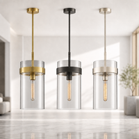 Luminaire suspendu moderne en verre cylindrique transparent avec finition en laiton pour hôtel, salle à manger et îlot de cuisine