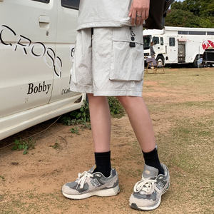 กางเกงขาสั้นสีกากีอเมริกันสำหรับผู้ชายกางเกงห้าส่วนทรงหลวมระบายอากาศแบบลำลองบางแบรนด์แฟชั่น2025ฤดูร้อนออกแบบโลโก้ได้ตามต้องการ - Product Image 3