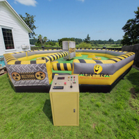 Jeux de machine pour enfants en plein air tournant avec carrousel jeux de sport gonflables jeu d'obstacles rotatifs gonflables