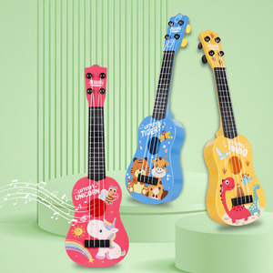 Mini Guitarra de Juguete Educativa para Niños, de Plástico ABS, Se Puede Tocar, Simula un Ukelele, Juego de 6 Instrumentos Musicales de Películas y Televisión, Caja de Colores - Product Image 1