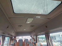 Minibus diesel d'occasion de type Coaster 22 places pour navettes en zone touristique, transport scolaire et voyages en groupe