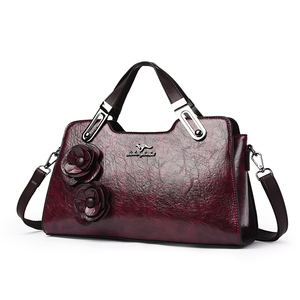 JIANUO Producto al por mayor Tienda en línea Bolsos Mujer Bolsos clásicos Bolso con colgante de flor - Product Image 1