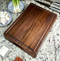 Tabla de cortar de madera de nogal sostenible, nogal negro macizo de 17x12x1.25 pulgadas, reversible con asas y ranura para jugos