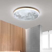 La lampe lunaire de style bois de noyer est un plafonnier LED simple, moderne et élégant dans le salon. Il est doté d'un poêle à bois