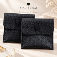 Pochette à bijoux en cuir PU noir de qualité supérieure avec fermoir cœur pour bagues, boucles d'oreilles et pièces de monnaie, personnalisable avec logo OEM/ODM, directement de l'usine