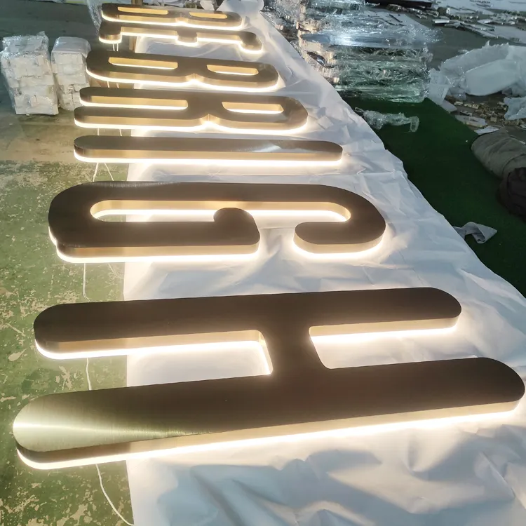 high quality well fabricated brushed gold translucent steel back lighting letter sign for shop mall