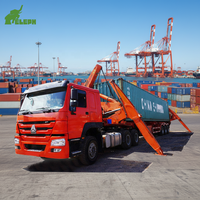 Camion à conteneurs Howo Sinotruck 20 pieds 8x4, camion à conteneurs à levage latéral, camion à conteneurs à chargement latéral