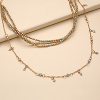 Collier de dentition multi-couches en alliage d'ambre baltique pour femmes
