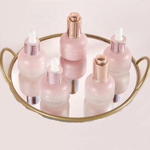 Belle bouteille en verre d'emballage cosmétique de soins de la peau rose avec pompe goutte à goutte automatique pour les cheveux <span class=keywords><strong>parfum</strong></span> essence yeux réparation sérum lotion crème - Product Image 2