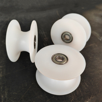 Poulie roue rouleau barre plastique OEM caoutchouc acier inoxydable Withbearings résistance à l'abrasion Nylon personnalisé petit blanc 3 ans