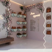 Aménagement intérieur de boulangerie, pâtisserie, café : présentoirs, mobilier, personnalisation complète de la pièce, vitrine en verre, décoration de café.