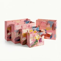 Sacs cadeaux personnalisés en papier d'art écologique de luxe en gros, forme rectangulaire avec poignée