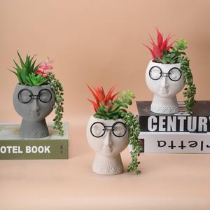 Pots de fleurs en céramique pas chers en <span class=keywords><strong>forme</strong></span> de tête, vases modernes en céramique et jardinières en plastique avec verdure artificielle pour la décoration - Product Image 1