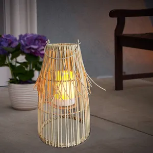 Hot Sale Outdoor WeatherProof Natural Color Plastic Solar Flameless Led Candle Fringe Style Solar Rattan Lantern With Iron Frame