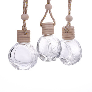 Venta al por mayor 10ml plano redondo coche colgante vidrio Perfume aromaterapia difusor botella cilindro recargable con tapas de madera - Product Image 4