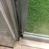 Estilo plegable deslizante utilitario con cerradura lateral Puerta de patio de vidrio sin marco