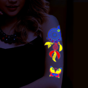 Vente chaude populaire transfert d'eau UV lueur dans le noir tatouage temporaire autocollants <span class=keywords><strong>de</strong></span> tatouage au néon pour les fêtes <span class=keywords><strong>de</strong></span> boîte <span class=keywords><strong>de</strong></span> <span class=keywords><strong>nuit</strong></span> - Product Image 2