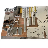 Accessoires pour foreuse hydraulique de roche : Plaque de support en aluminium pour poutre de poussée, Bande anti-usure pour curseur, Piston d'impact