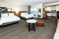 Meubles d'hôtel haut de gamme Staybridge Suites pour projets hôteliers : Canapé, Table, Chaise, Lit