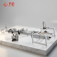Machine de découpe automatique des bords Tongchi Machinery pour application de film sur panneaux, épaisseur maximale 18 mm, largeur maximale 1300 mm, réduit le travail manuel