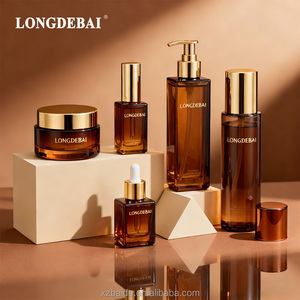 Elegant Amber Glass Serum <b>Bottle</b> Set for Premium Cosmetics 30ml to 150ml Glossy Finish and Airless Pump - Product Image 1