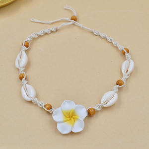 Nouveau design naturel coquille de mer cauri tissé tour de cou mode Hawaii plage Plumeria fleurs perles de bois tressé déclaration collier - Product Image 2