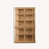 Vitrine haute élégante et moderne en verre noir à 2 portes avec côtés en verre incurvé et bordure d'étagère dorée pour salon, personnalisable OEM