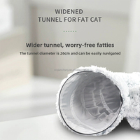 Lit tunnel pour chat en peluche chaud et confortable, populaire, pliable, en forme de donut, en forme de tube de pneu, pour l'intérieur