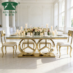 Mesa de Comedor Rectangular de Diseño Elegante en Acero Inoxidable Dorado con Sillas - Product Image 1