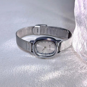Reloj exquisito de estilo retro para estudiantes, pequeño y sencillo, moderno, de forma ovalada, analógico. - Product Image 4