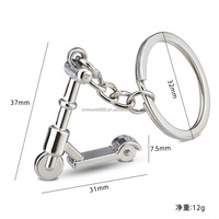 WOWEI Porte-clés intéressant, pendentifs porte-clés de divers modèles Mini porte-clés de skateboard Accessoires de patins à roulettes