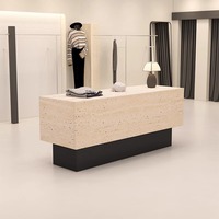 Table d'exposition îlot moderne et durable avec combinaison libre et comptoir de caisse pour les magasins de vêtements et de chaussures