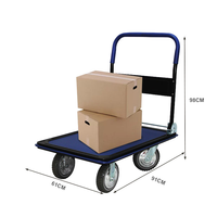 Chariot à plateforme à 4 roues bleu et noir pour entrepôt