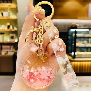 Joli porte-clés pendentif en forme de cœur avec fleur de cerisier, bouteille d'huile, accessoires pour sac, porte-clés de voiture, pendentif liquide Kawaii, cadeau - Product Image 4