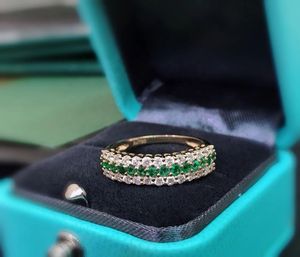 Bague de mariage minimaliste et délicate Xinfly 18K entièrement sertie d'émeraudes vertes et de diamants - Product Image 3