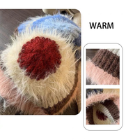 Chapeau d'hiver tricoté en molleton moelleux pour femmes, accessoire de mode doux et chaud pour les voyages.