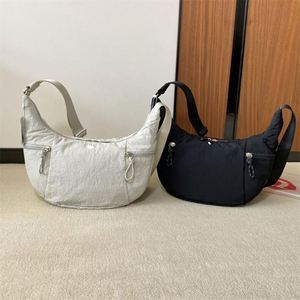 Sac à dumplings A18, Nouveau sac en corne de vache, Sac à main bandoulière pour femme, Sac de sport et de fitness, Sac de yoga hydrofuge - Product Image 1