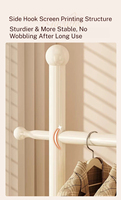 Porte-vêtements minimaliste noir mat avec étagères en maille pour salle de bain, chambre, derrière la porte, usage quotidien d'organisation à domicile