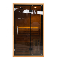 Salle de sauna traditionnelle en bois d'hemlock pour 2 personnes, intérieur luxueux, avec verre brun