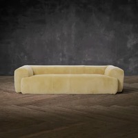 Canapé contemporain audacieux, super doux, profondément rembourré, en peau de mouton naturelle de qualité supérieure