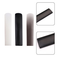 Accessoires pour saxophone en gros, disponibles en trois couleurs. Embouchures de trompette, saxophone ténor