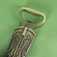 Ouvre-bouteille en alliage de zinc antique et traditionnel en forme de botte de cowboy, idéal pour les mariages, les fêtes, les baby showers et comme cadeau pour les garçons d'honneur.