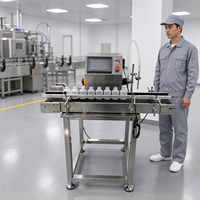 Machine de remplissage de liquides semi-automatique avec construction en acier inoxydable, adaptée aux applications des boissons et des cosmétiques