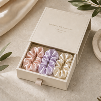 Élastiques à cheveux en soie de mûrier biologique multicolores à marque privée avec boîte cadeau pour femmes