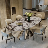 Table à manger ovale en pierre frittée avec 4 chaises et pieds robustes en acier au carbone pour hôtel, villa, maison et restaurant, usage quotidien