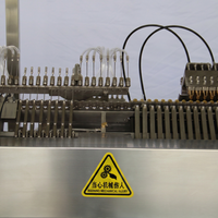 Machine de remplissage et de scellage d'ampoules
