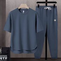 Ensemble deux pièces sport d'été fin pour homme et femme : T-shirt streetwear à manches courtes et pantalon décontracté – Vente en gros
