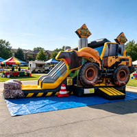 Structure gonflable robuste sur le thème de la construction, avec pelle excavatrice, château gonflable et toboggan, pour la location lors d'événements communautaires en extérieur