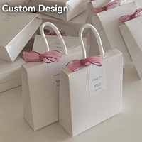 Sac cadeau en papier blanc avec ruban en organza, étiquette de remerciement, poignée en corde de coton portable, sac de transport pour cadeaux